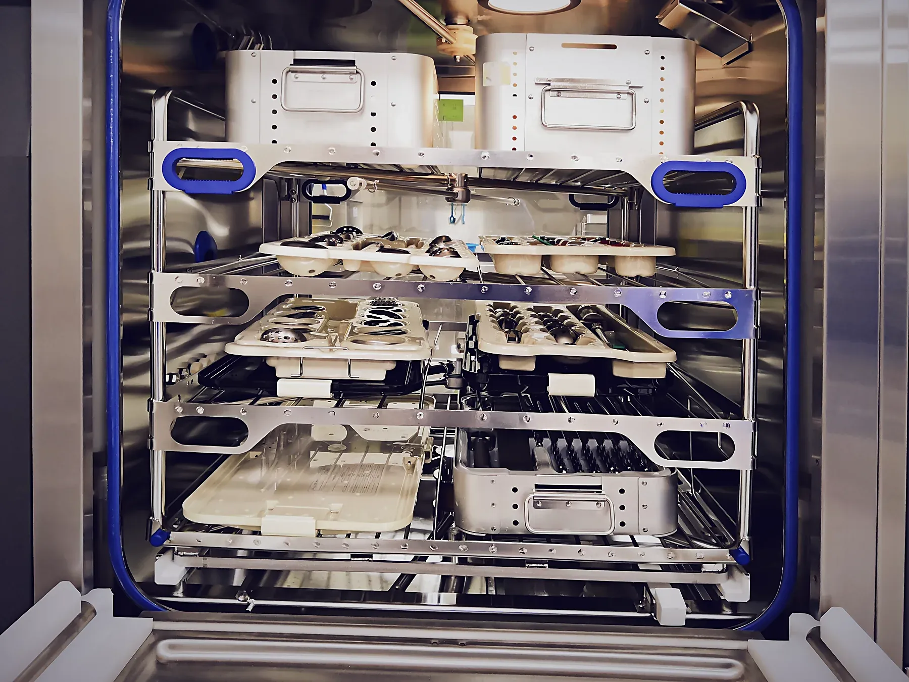 Instrument trays loaded in a hospital steriliser